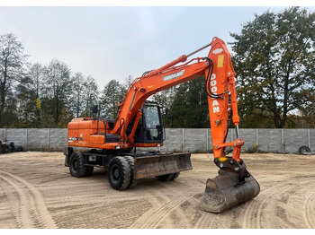 Excavadora de ruedas DOOSAN DX140W-3